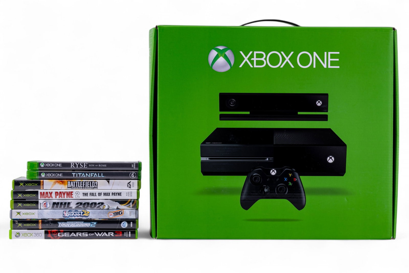 NOS Xbox One, Eight Xbox Games: A grouping including a NOS Xbox One that has never been taken out of packaging (box has been opened), along with eight games from Xbox, Xbox 360, and Xbox one. All items present in Xbox one box.