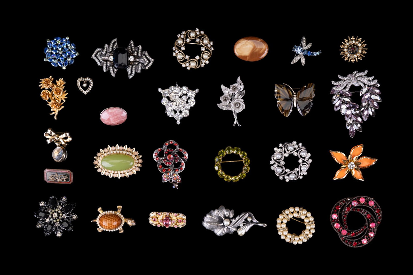 Designer Rhinestone and other Brooches: A collection of vintage brooches featuring designers such as B. David, Monet, Coro, Tortolani, Jonette Jewelry, Bruneau Jasper cabochon with sterling pin backing, and others.
