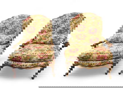 Pair of Century Hickory Inc. Armchairs: A pair of French style floral upholstered wide armchairs, measuring approx. 42.5" high overall, 29" wide. Comes with two pillows with matching upholstery.