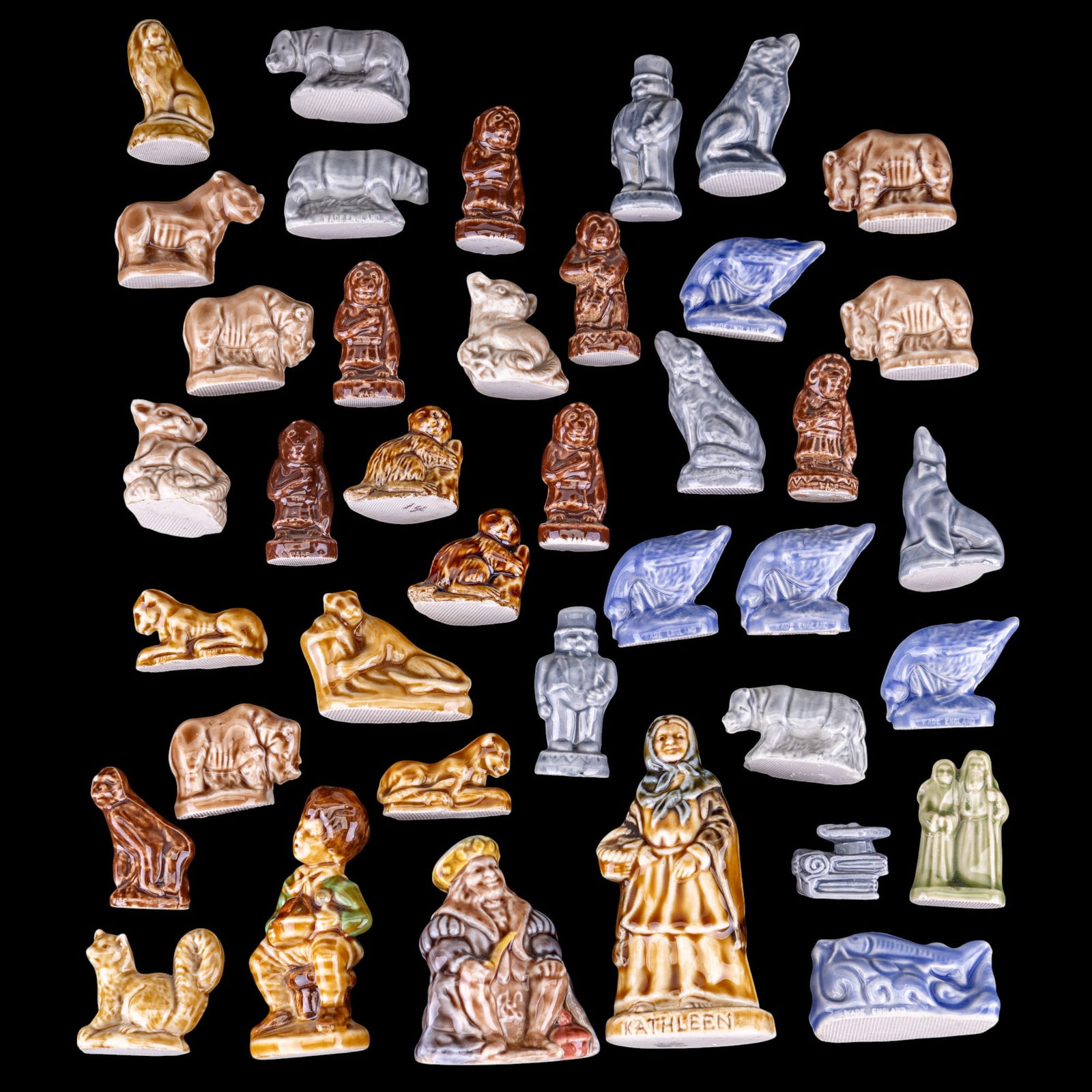 Wade England Whimsies (39): A collection of 39 glazed ceramic Wade England whimsies, also including two figurines from the Nursery rhyme series.