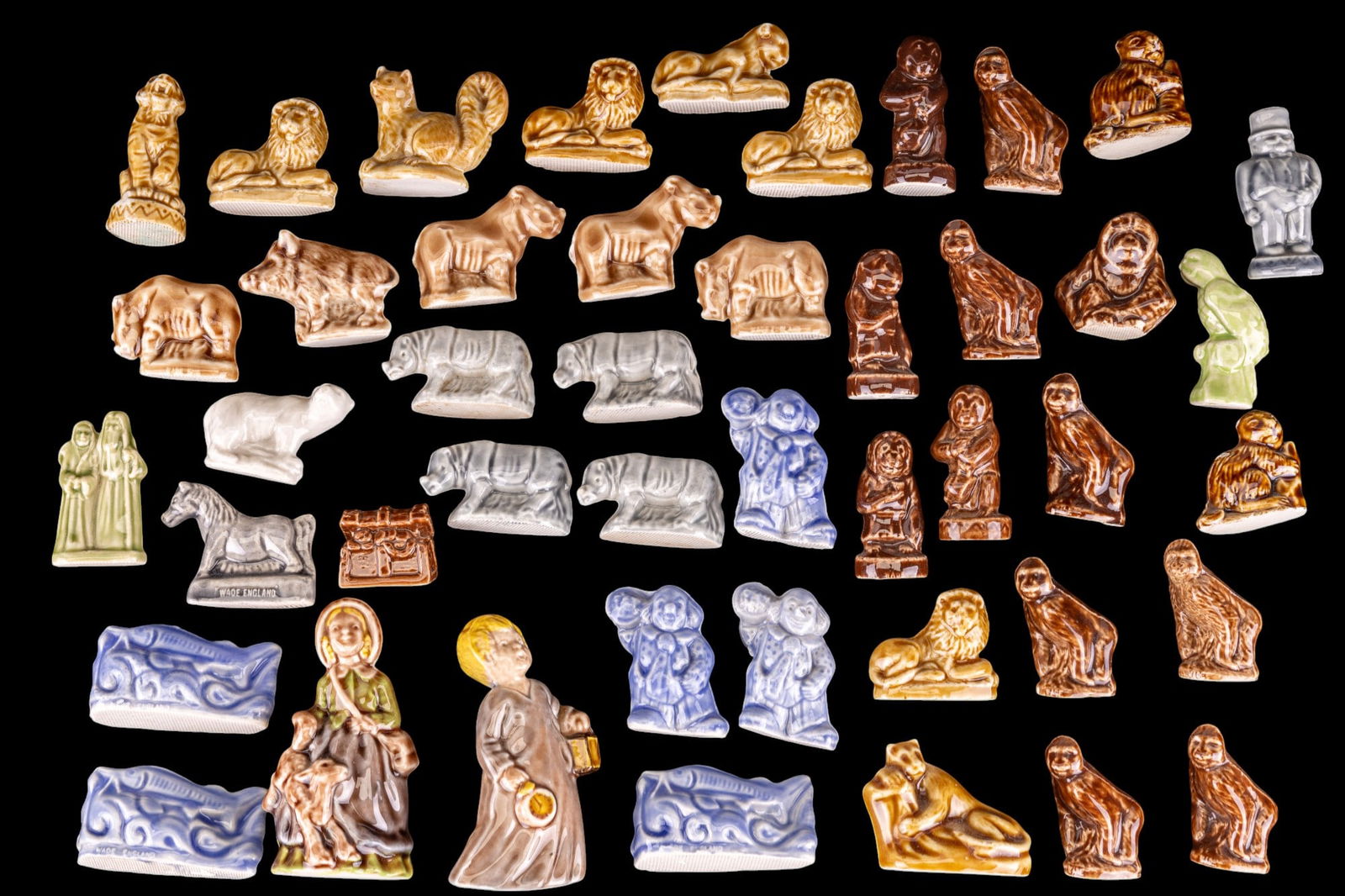 Wade England Whimsies (45): A collection of 45 glazed ceramic Wade England whimsies, also including two figurines from the Nursery rhyme series.