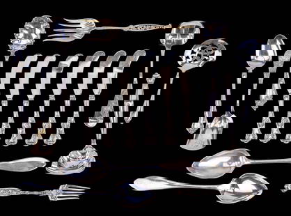Sterling Silver Service Flatware: An assortment of sterling silver flatware service pieces including two sterling Towle serving spoons, a slotted spoon by Manchester Silver Co, a berry spoon by Mechanics Silver Co by Watson, tea spoon
