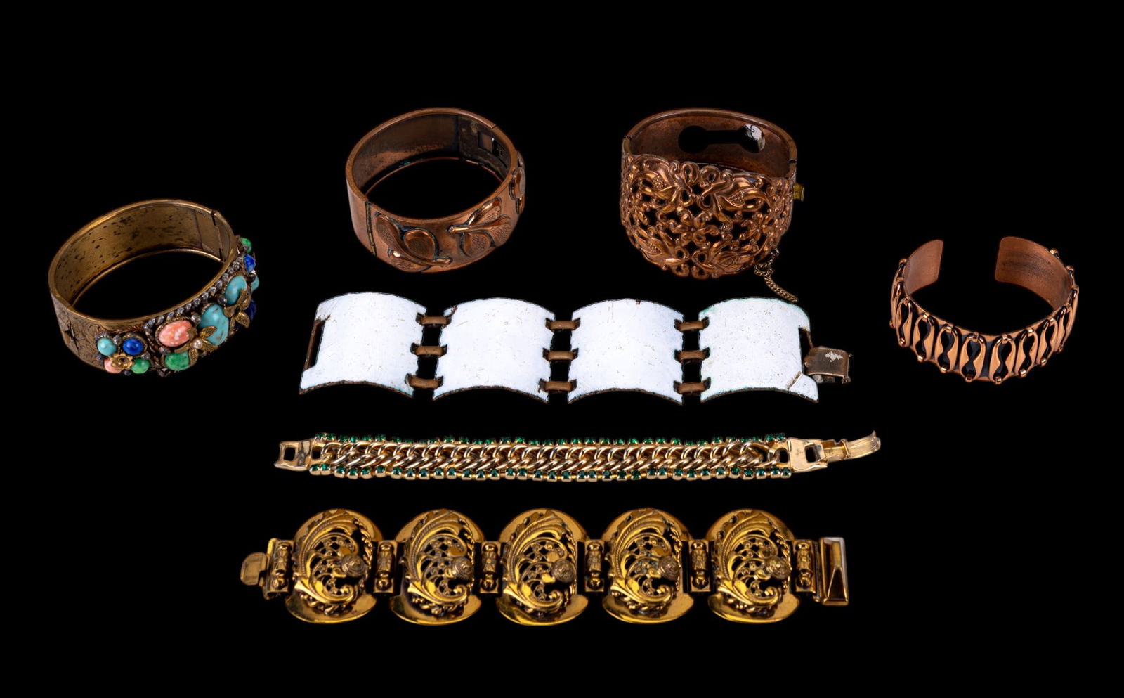Renoir, Coro, and Vintage Bracelets: Early bracelets including signed Renoir copper cuff, Coro goldtone chain, and unsigned white enamel wide bracelets.