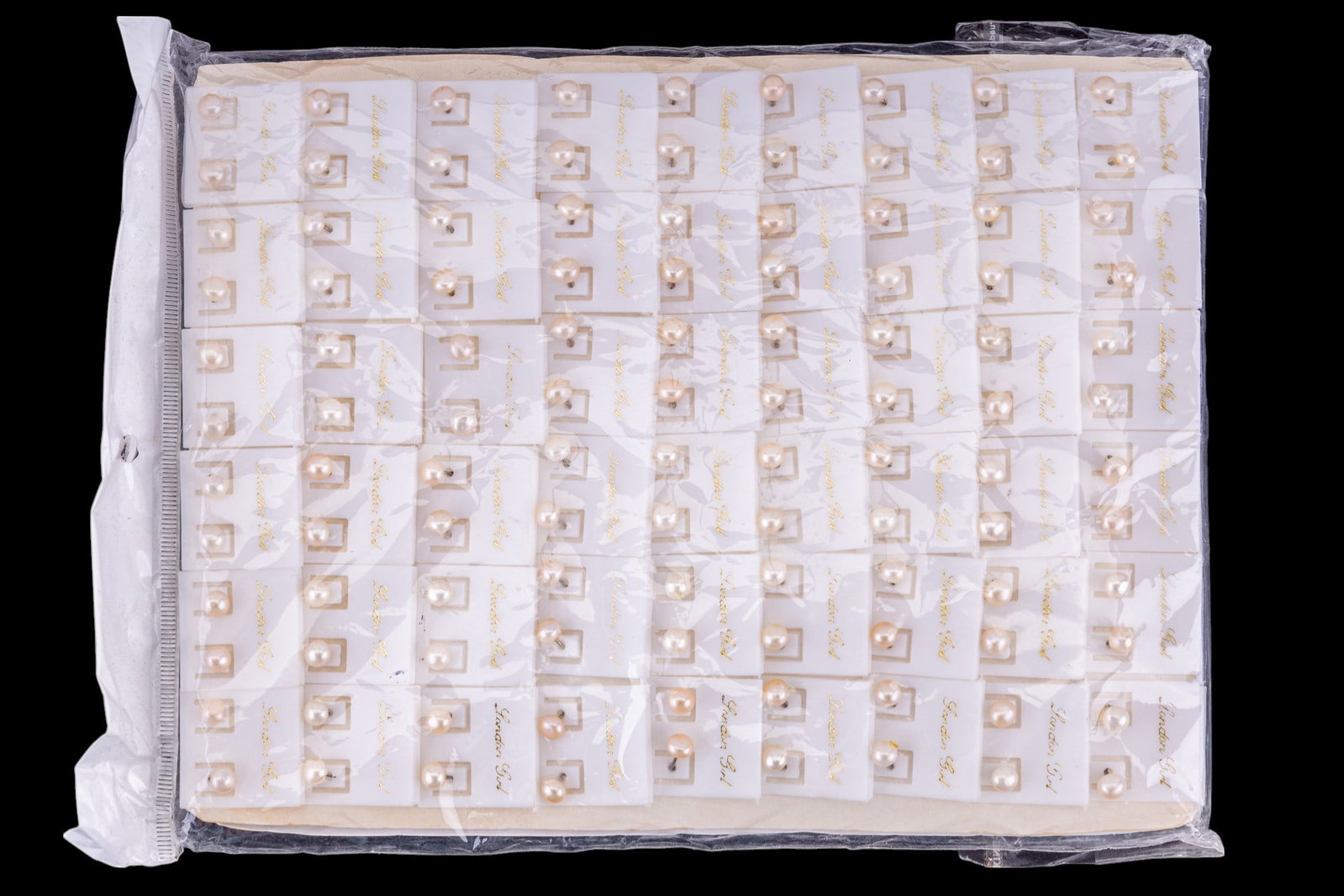 100+ Pairs of Pearl Stud Earrings: 100+ pairs of pearl stud earrings (all marked "London Girl")
