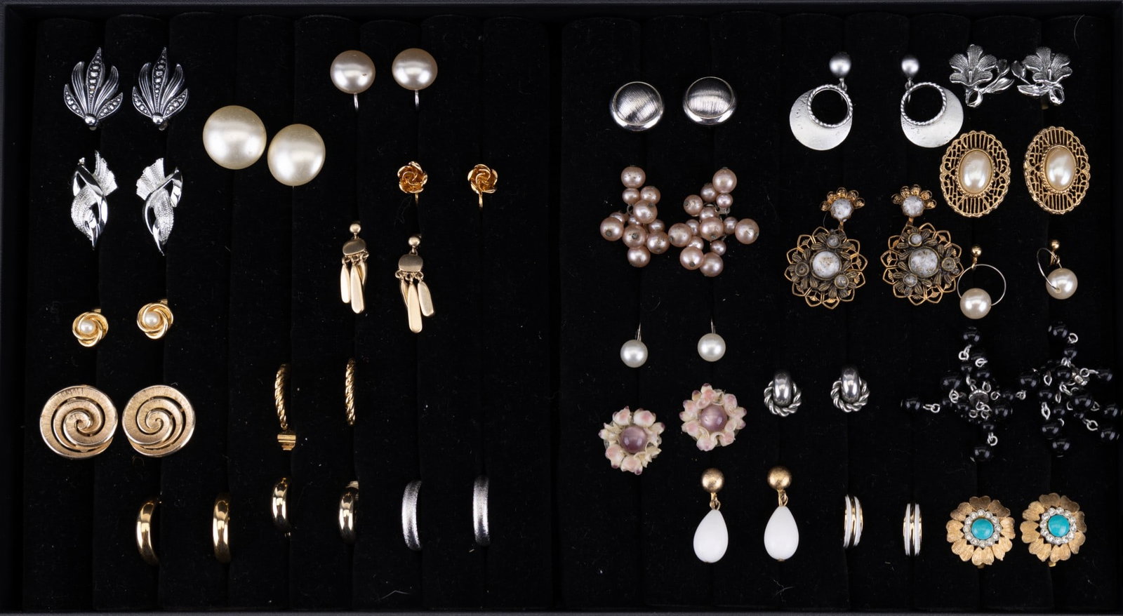 Designer and Vintage Costume Earrings: A collection of 25 pairs of vintage costume clip on and screw back earrings, some unmarked, and some designer brands featuring Trifari, Monet, Marvella, Vendome, Coro, Richeleau, and Liz Claiborne,