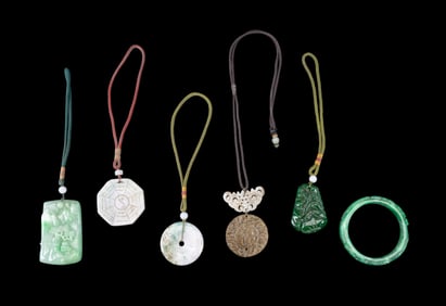 Carved Nephrite and Green Hardstone Medallions