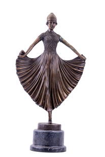 Art Deco Cast Bronze Dancing Woman: A cast bronze sculpture of a flared-skirted Art Deco dancer wearing a beaded bodice and stylized helmet. Statue sits on a black marble base. Measures approx. 22" H x 11" W at widest part.