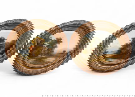 Pair of Antique O/c Paintings Under Bubble Glass: A pair of 19th Century oil on canvas landscapes housed in convex glass. Each painting depicts serene countryside scenes with cottages, trees, and figures. The reverse of both paintings have paper labe