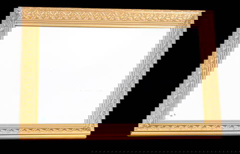 Bombay Company Ornate Beveled Mirror: A wall mirror by the Bombay Company, titled "Holly Leaf Mirror" with a molded frame with scrolling holly leaf detailing with beveled glass. Mirror measures approx. 30.5" W x 42.5" H.
