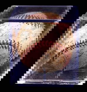 1954 New York Yankees Team Signed Baseball: 1954 New York Yankees team signed baseball in an acrylic case, featuring signatures such as Mickey Mantle, Harry Byrd, and more. Note some wear due to age. No COA. Sports memorabilia.