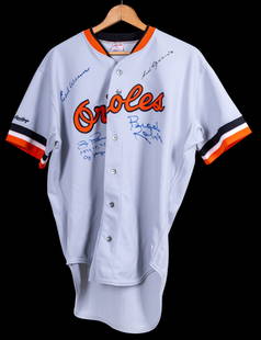 Baltimore Orioles Multi-Signed Jersey: A Baltimore Orioles button-up jersey hand-signed by four iconic Hall of Famers:Brooks Robinson, Earl Weaver, Luis Aparicio, and Jim Palmer. Sports memorabilia.