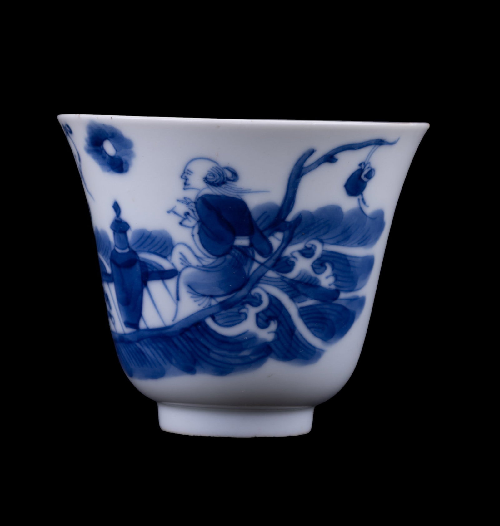 Chinese Blue & White Porcelain Teacup w/ Mark: A hand-painted blue & white 18th century porcelain teacup depicting scholarly figures and a crane in a cloudscape, rendered in deep cobalt underglaze. The foot bears a Kangxi reign mark. Measures appr
