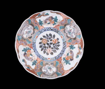 Antique 19C Japanese Imari Charger: A 19th-century Japanese Imari porcelain charger with alternating panels of cranes and tortoises among pine and bamboo, symbolizing longevity and prosperity. Center medallion features a floral spray. C