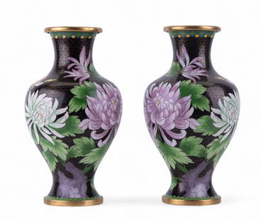 Chinese Cloisonne Vases (2): A pair of Chinese cloisonne enamel vases with a black background adorned with pastel chrysanthemum blossoms and butterflies, gilt rims and bases. Each measures approx. 12.5" H with a mouth diameter of
