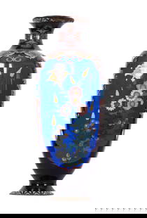 Japanese Meiji Cloisonne Floor Vase: A Japanese Meiji cloisonne floor vase featuring dragon and floral motifs over blue base. Some cracking and loss at rim (see photos). Measures approx. 23.5" H with a mouth diameter of 6".