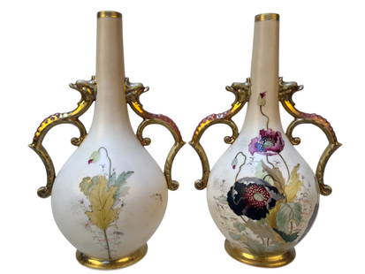 R.H. Austria Hand-Painted Porcelain Vases (2): A matched pair of porcelain double-handle vases marked R.H. Austria, each finely hand-painted with floral motifs, oak leaves on one side and a floral arrangement on the other. Vases feature bird-head