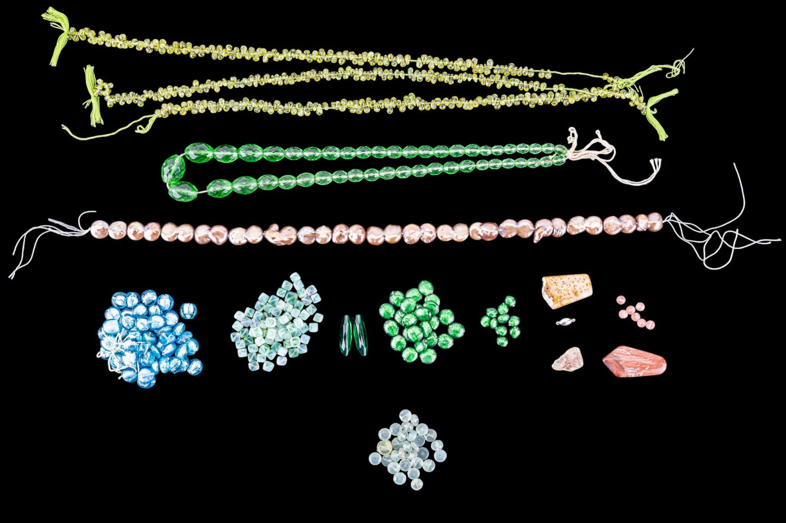 Vintage Peridot and Pearl Strands: Semi-precious peridot and Champagne pearl strands, emerald green colored, enhanced sunstone, Oregon-sunstone, and more.