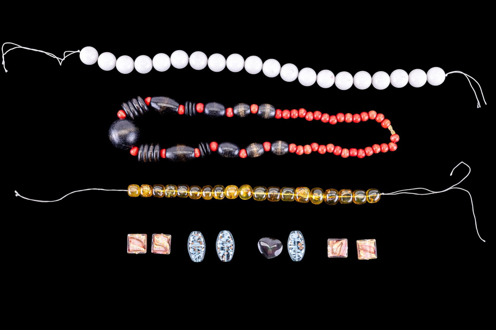 Amber and Stone Variety Collection: Vintage Amber strand, some with insect inclusions, polished white agate beads from Rio Grande, turquoise art glass, and other beads.