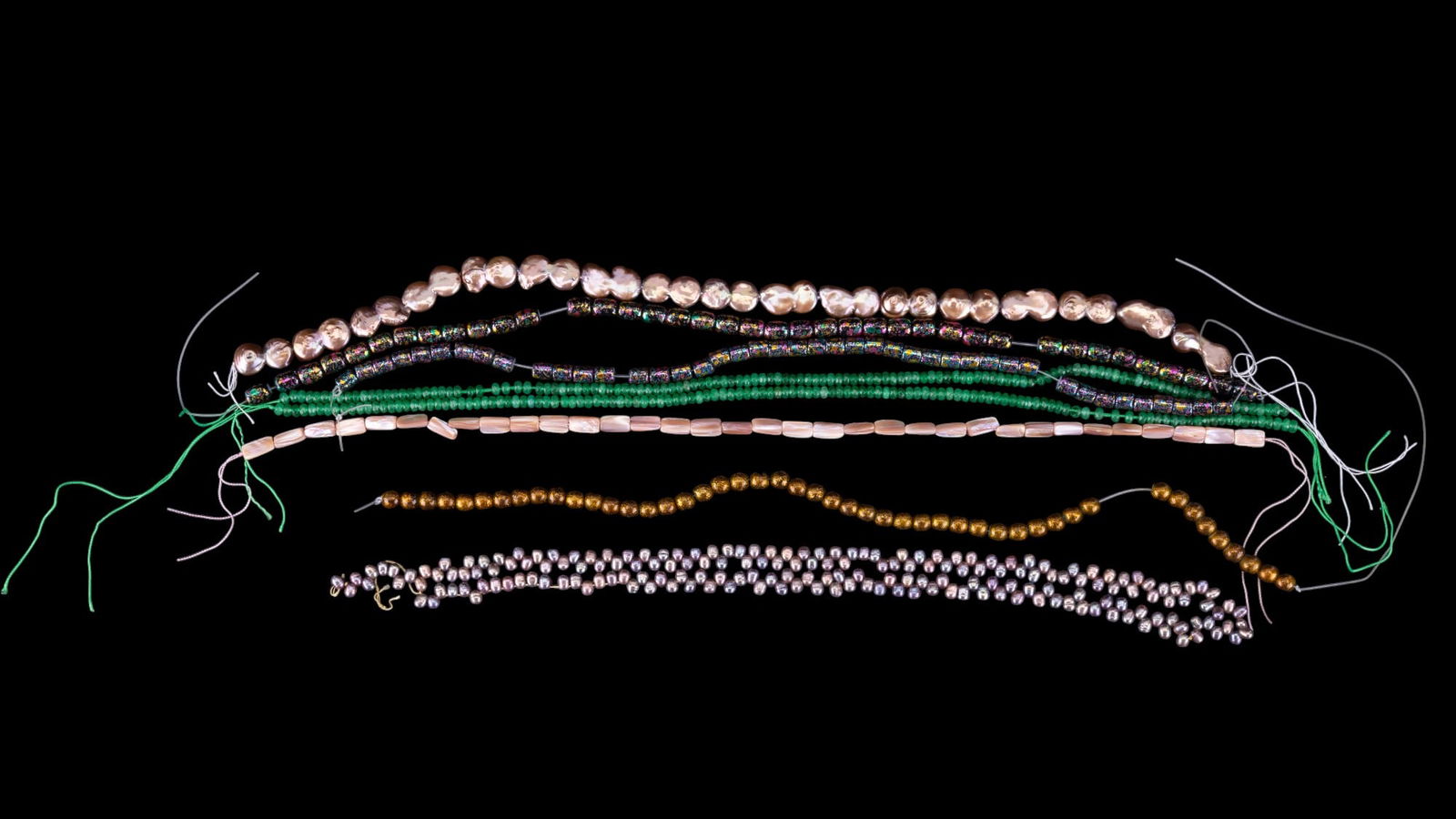 Vintage Pearl Strands: Various vintage multi colored pearl and other quartz strands.
