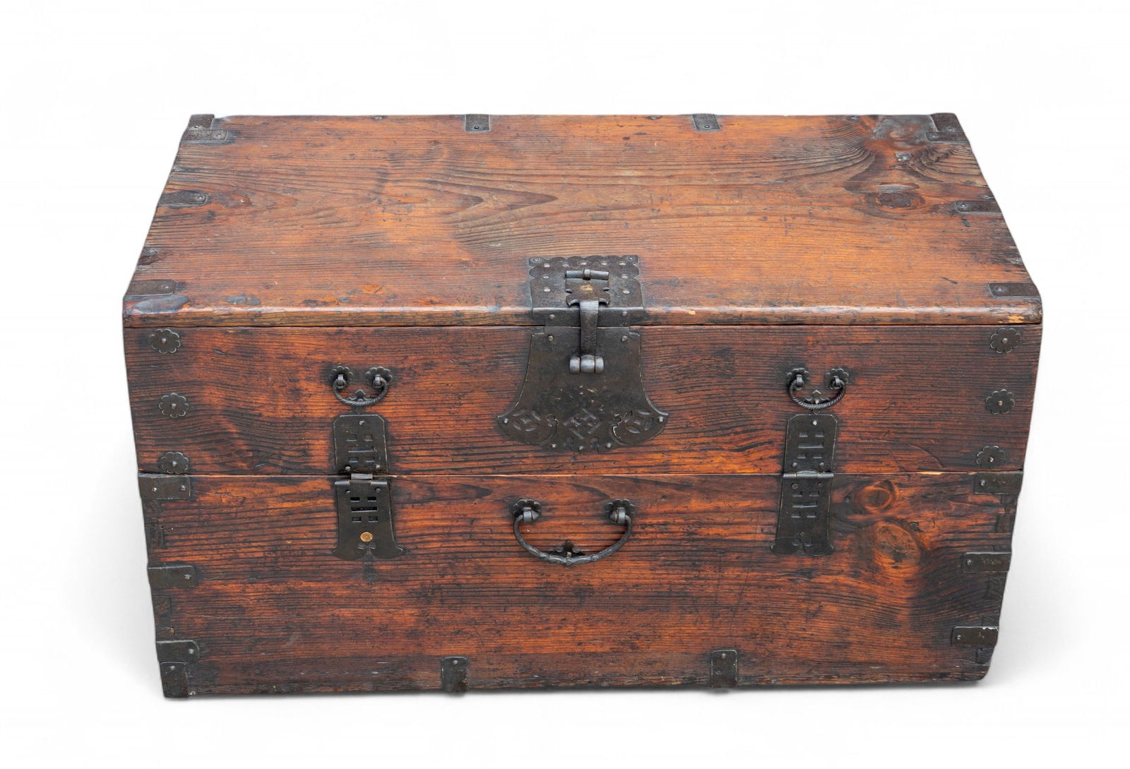 19/20th C Asian Chest: Asian chest with cast iron lock and mounts, dovetailed joinery, front door access with swing door (hinges missing pins). Measures approx. 19" H x 34.5" W x 16.5" D.