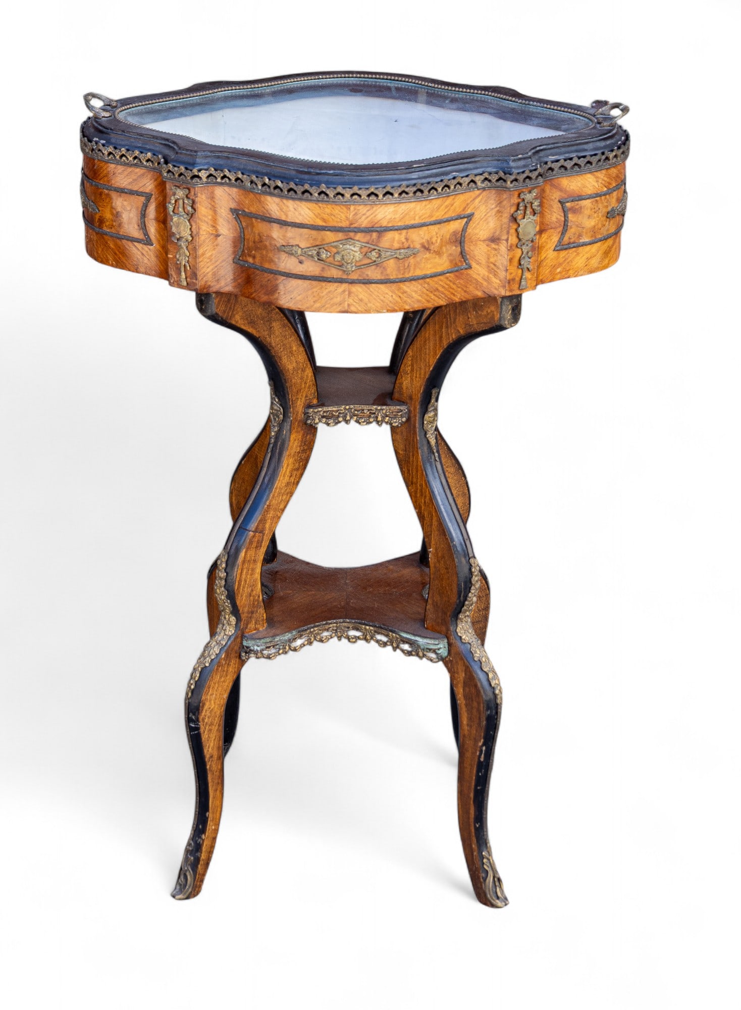 French Footed Curio Cabinet: A French footed curio cabinet with lift out glass top, tuffeted white interior over higly figured wood and bronze footed base. Top lifts off and can be used as tray. Measures approx. 34.5" H x 23" W x