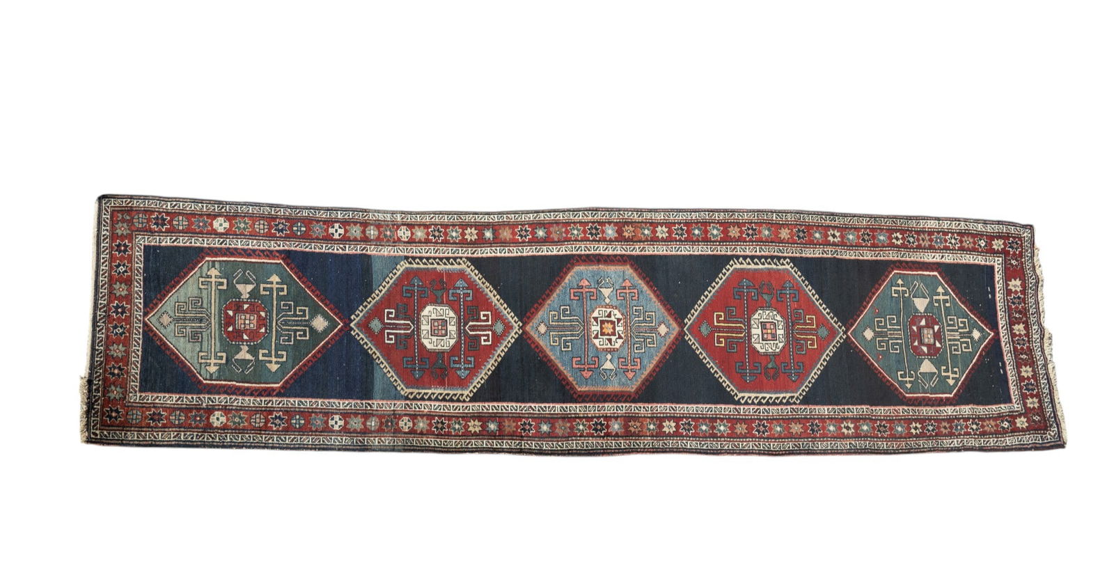 Persian Antique Rug: A Persian antique rug. Measures approx. 3'5" x 12'11".