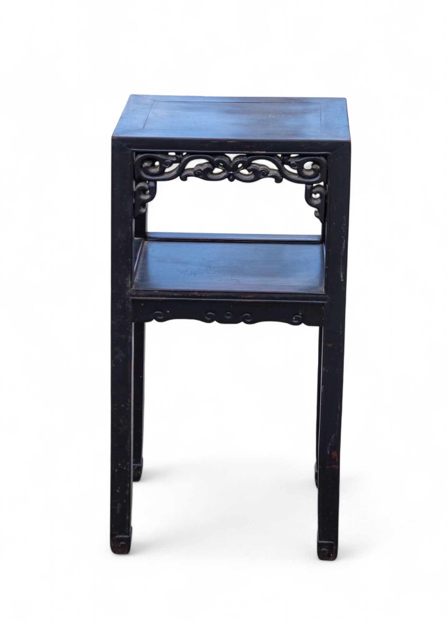 Chinese Hardwood Accent Table: A Chinese hardwood accent table all sides have carved apron accents. Measures approx. 31.5" H x 16" W x 12" D.