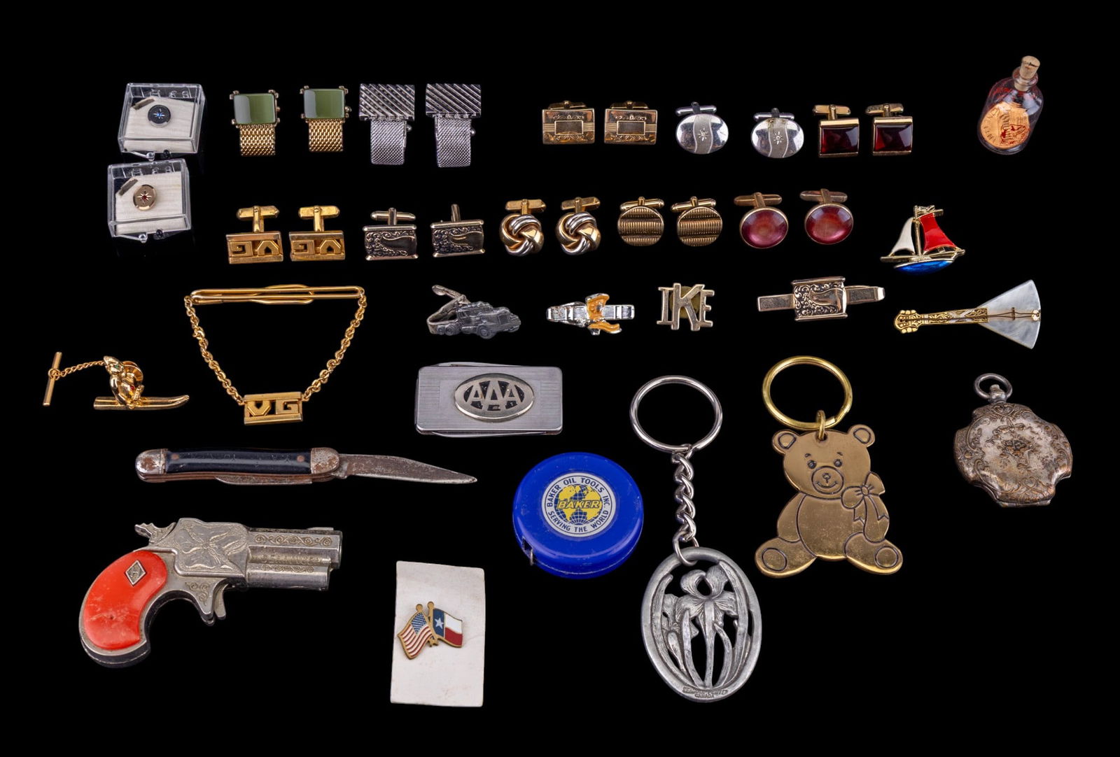 Vintage Cufflinks, Hubley, Locket, Pinbacks: Mostly men's accessories with 9 cufflinks, one with a matching tie clip, and six ?additional tie clips/pins, some MOP. Hubley Derringer toy cap gun, embossed vintage pendant (pocket watch case?) locke