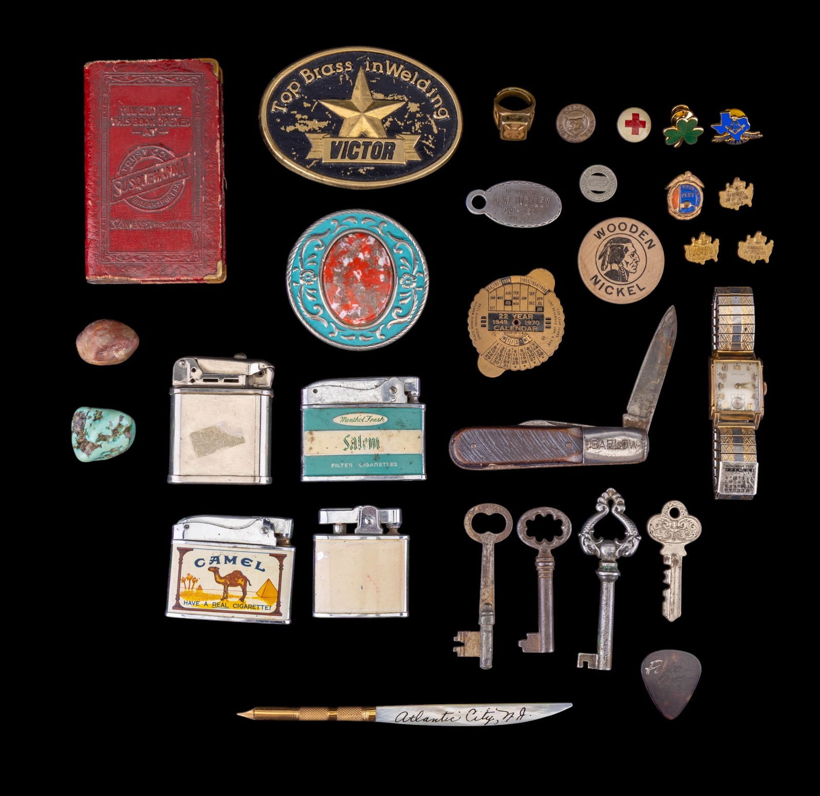 Vintage Keys, Lighters, and Small Items: Tray featuring a diverse assortment of vintage keys, lighters, pins, jewelry, and coin bank. Highlights include a Susquehanna Bank coin bank, lighters designs, a 14K gold filled Hamilton 19 jewel wris