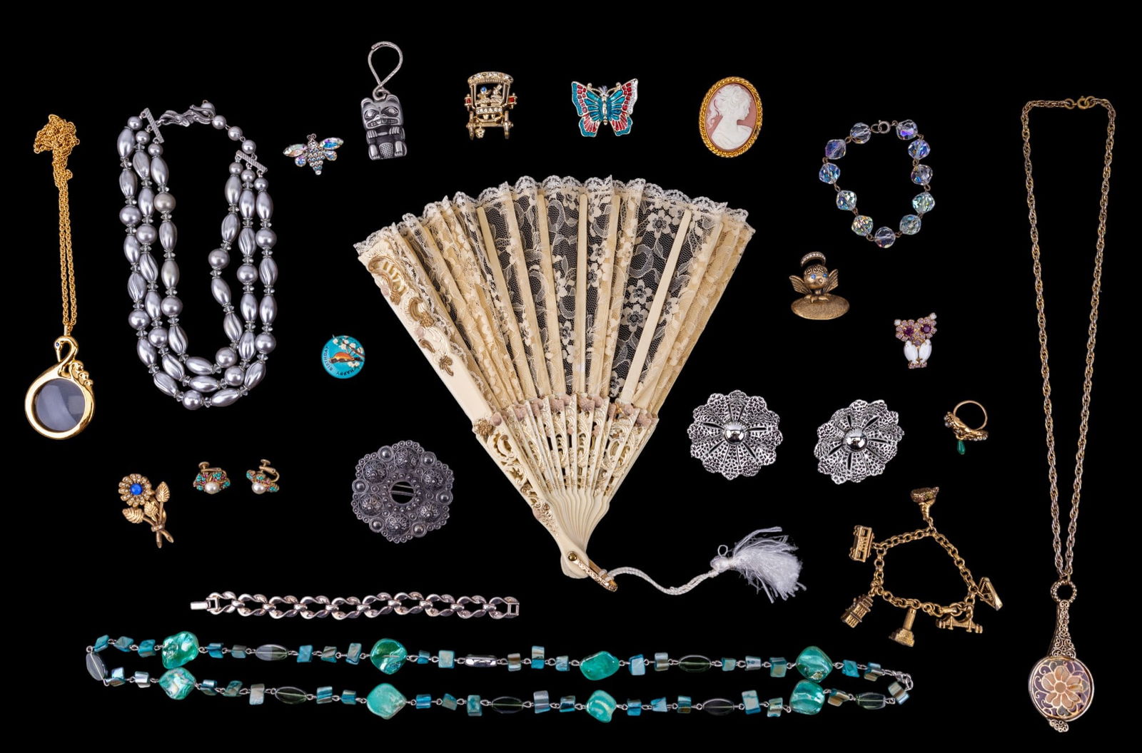 Vintage Estate Jewelry: Vintage jewelry includes silver tone mod retro necklace, blue shell and swan magnifying necklaces, celluloid and lace personal fan made in Spain, crystal and other bracelets brooches including cameo s