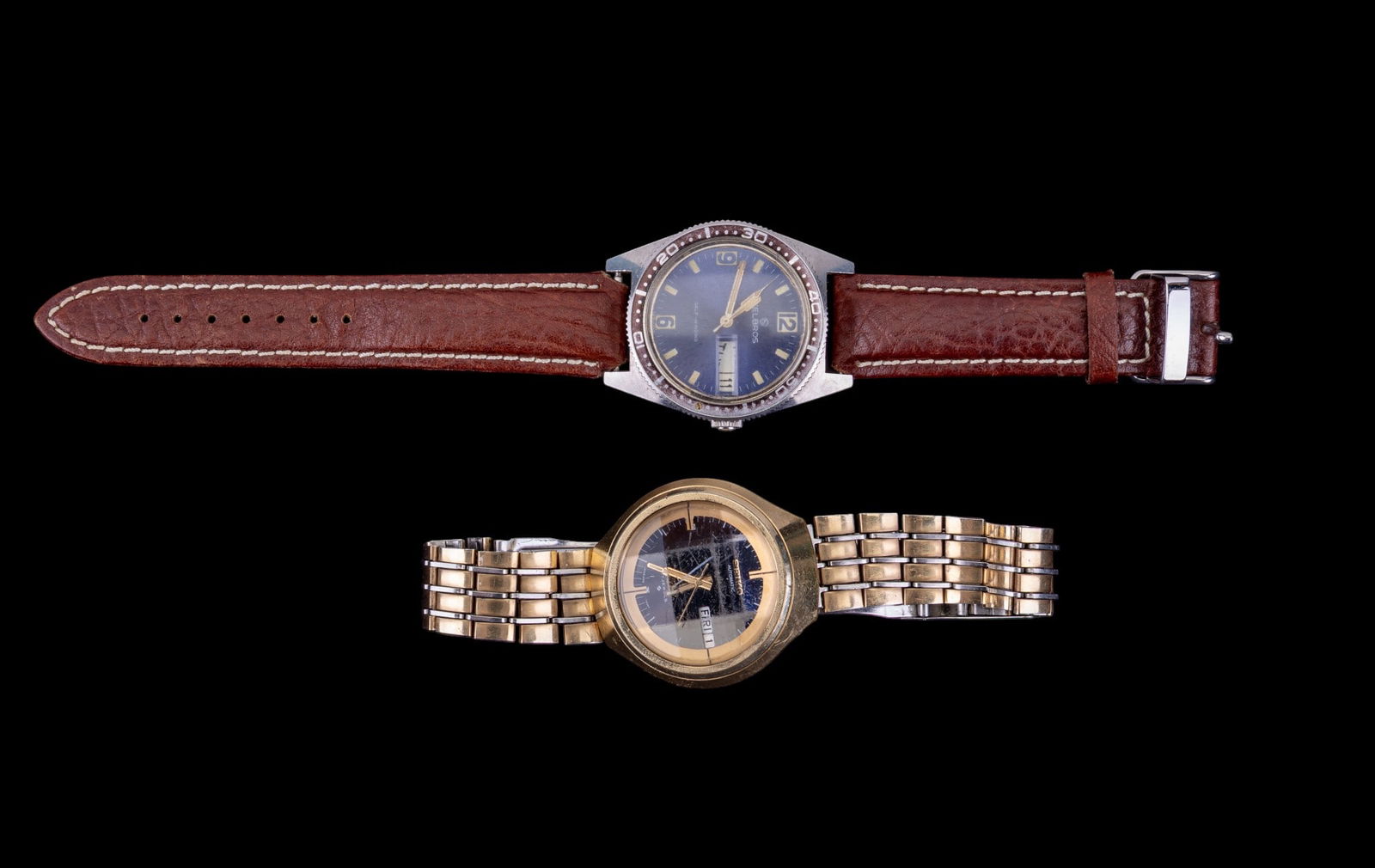 Helbros and Seiko Men's Wrist Watches: A Helbros men's wrist watch with stainless bezel and leather band and a Seiko men's water resistant wrist watch featuring a facet cut glass face cover, # 440477, both appear to be in working condition