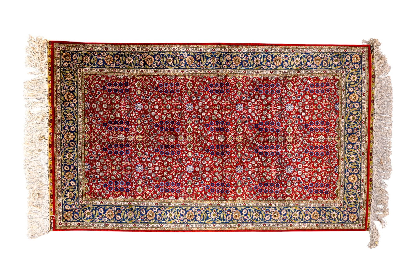 Signed Persian Silk Carpet: A finely woven Persian silk carpet with intricate floral motifs on a red and blue ground, bearing a woven signature. Measures approx. 62" x 36"