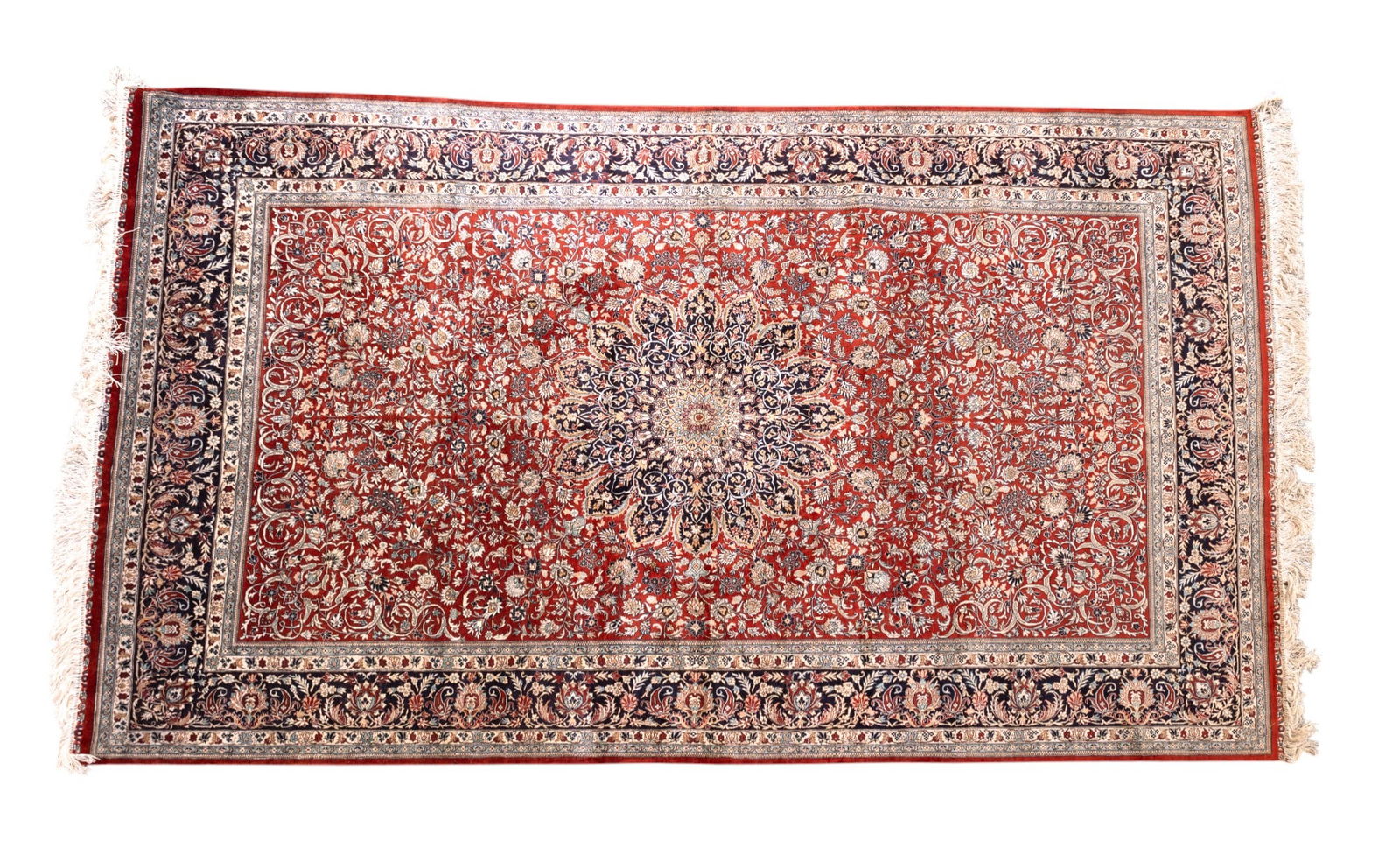 Large Persian Silk on Silk Carpet: A fine Persian silk on silk carpet of large size, featuring intricate floral and geometric motifs, measuring approx. 8' x 5'.