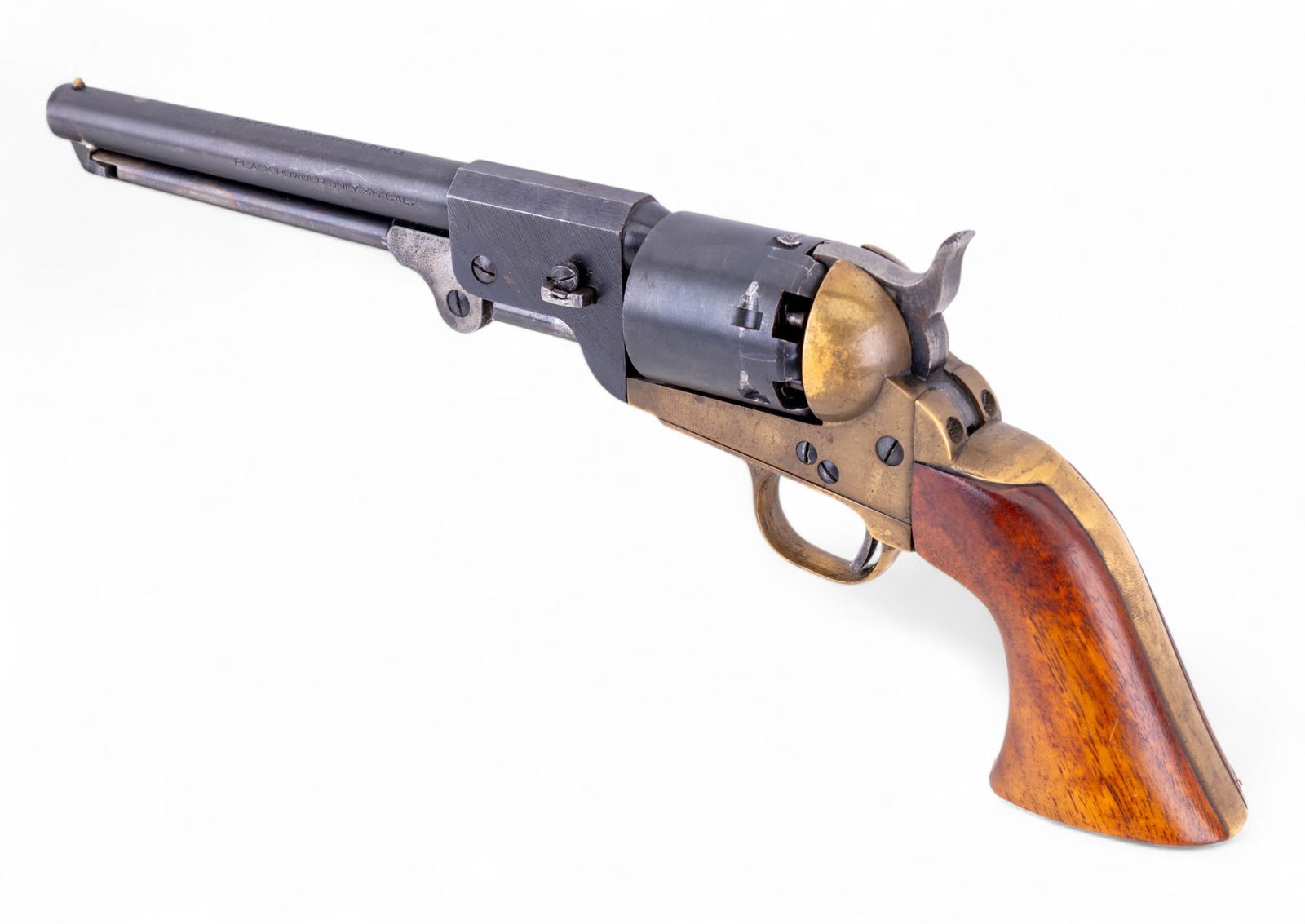 1851 Navy Arms Co. .36CAL 6-Shot Revolver: 1851 Navy Arms Co. .36CAL 6-shot single action percussion revolver featuring 7.5" barrel, blue steel finish, brass frame, le=loading lever, walnut grip, clean bore cylinder, indexes correctly, includi