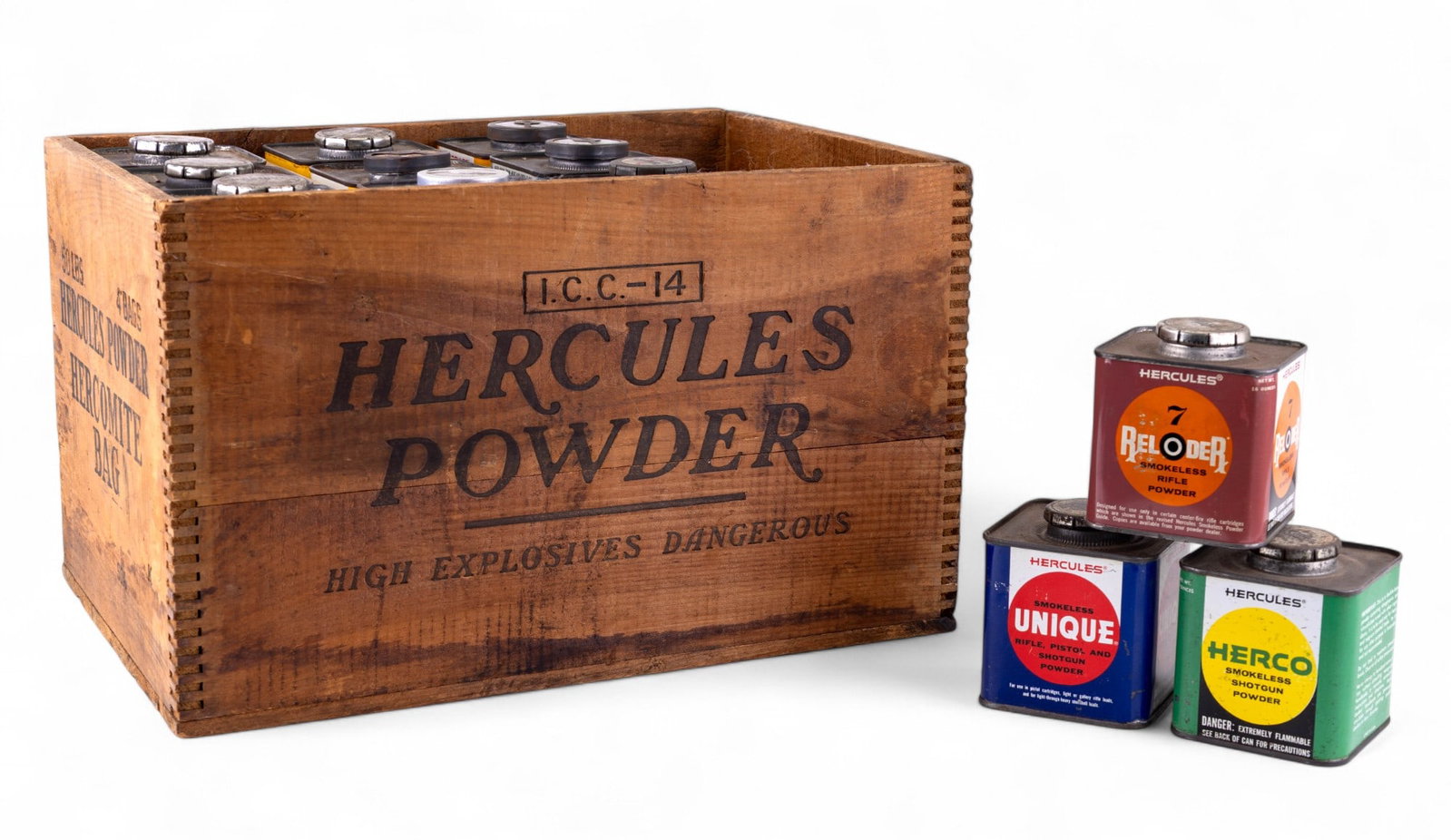 Hercules Powder Wooden Crate w/ Tins: Original wooden crate stenciled "Hercules Powder - High Explosives Dangerous" with additional side markings including "Hercomite Bag" and Hercules strongman logo. Crate houses 12 original square Hercu
