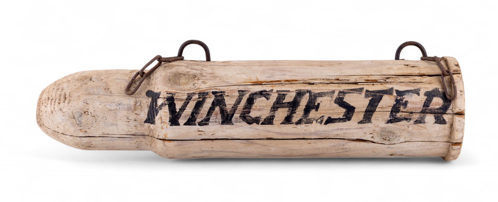 Winchester Wooden Painted Advertising Sign: Winchester advertising display, hand-painted on wood in the form of a large cartridge. Cylindrical with domed top, painted "Winchester". Retains original hanging chain hardware. Used as a gun shop poi