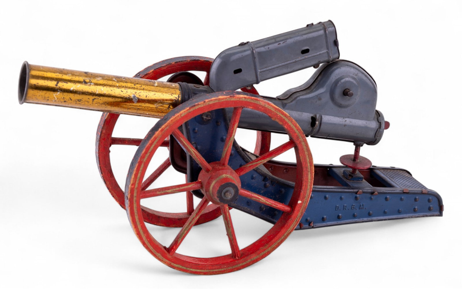 Early Hand Crank Toy Cannon: Early hand crank toy cannon with metal body and wooden wheels, shoots wooden balls, no balls present, in working condition.