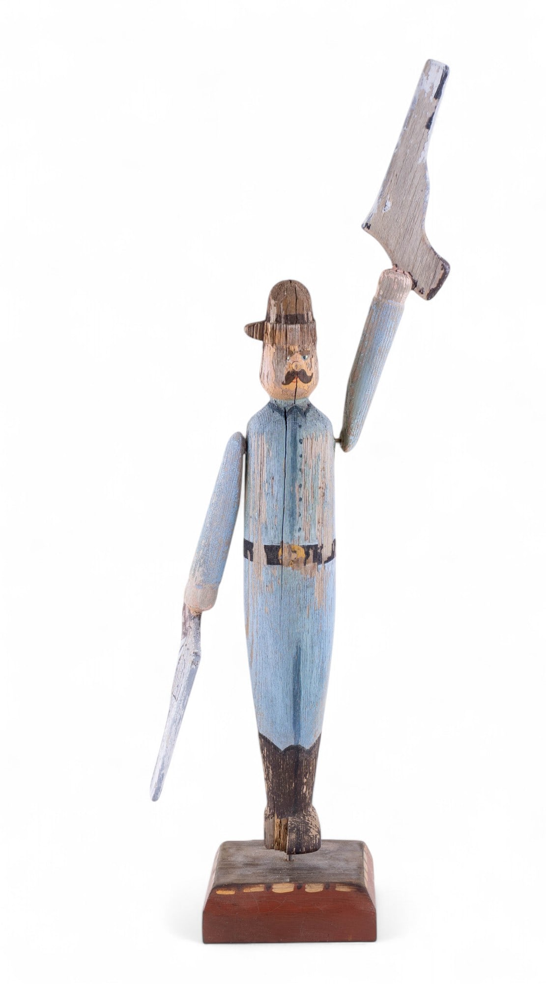 Wooden Keystone Cop Whirly Gig: Early Keystone Cop whirly gig figurine hold ing two pistols, on wooden stand, heaight measures approx. 16" to the top of the helmet and 21" to the tip of the upright pistol.