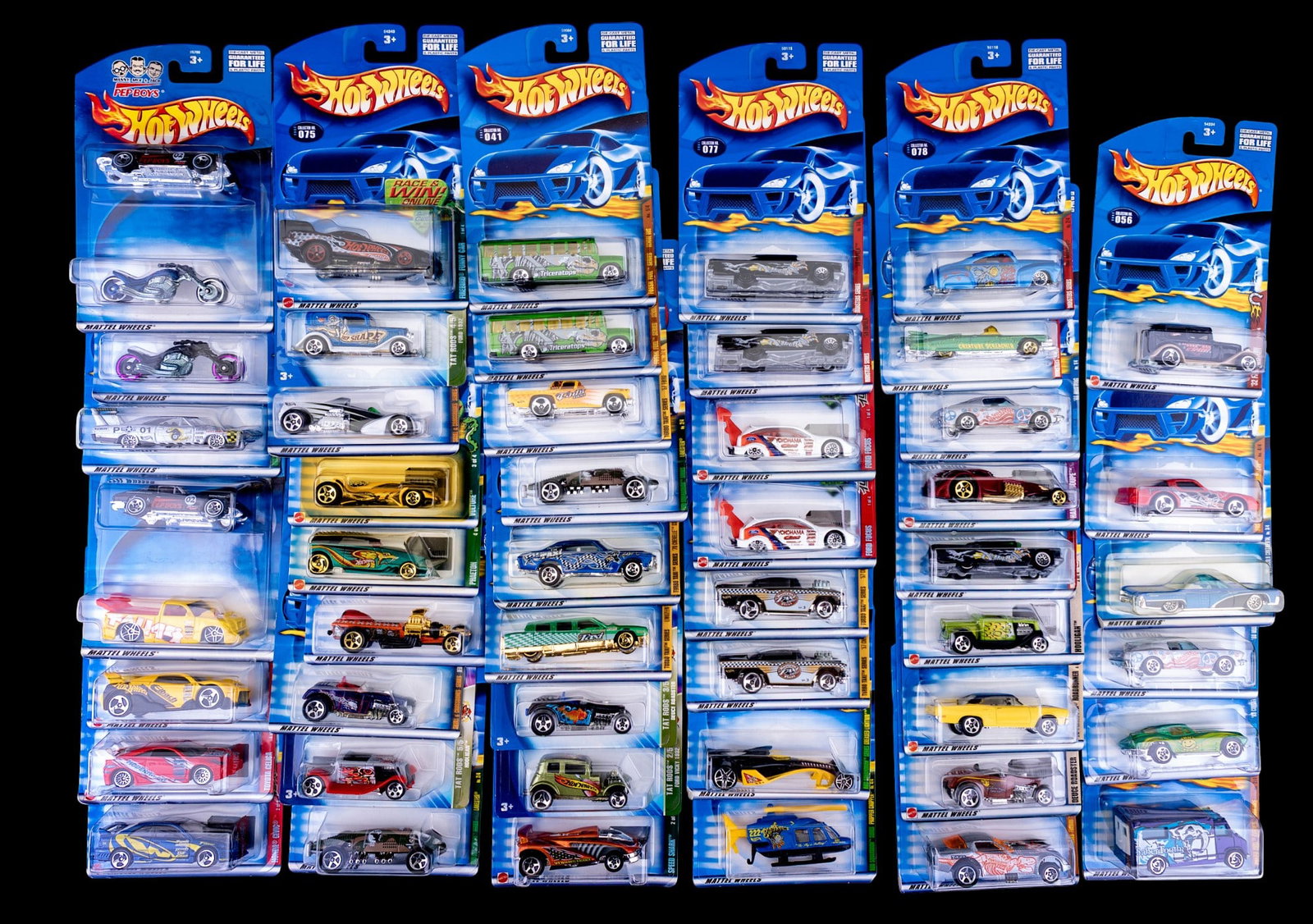 Hot Wheels Die-Cast Cars, Carded: Collection of Hot Wheels die-cast cars, all factory sealed on original cards. Includes a mix of classic hot rods, fantasy racers, motorcycles, promotional issues, and muscle cars. Some multi-packs wit