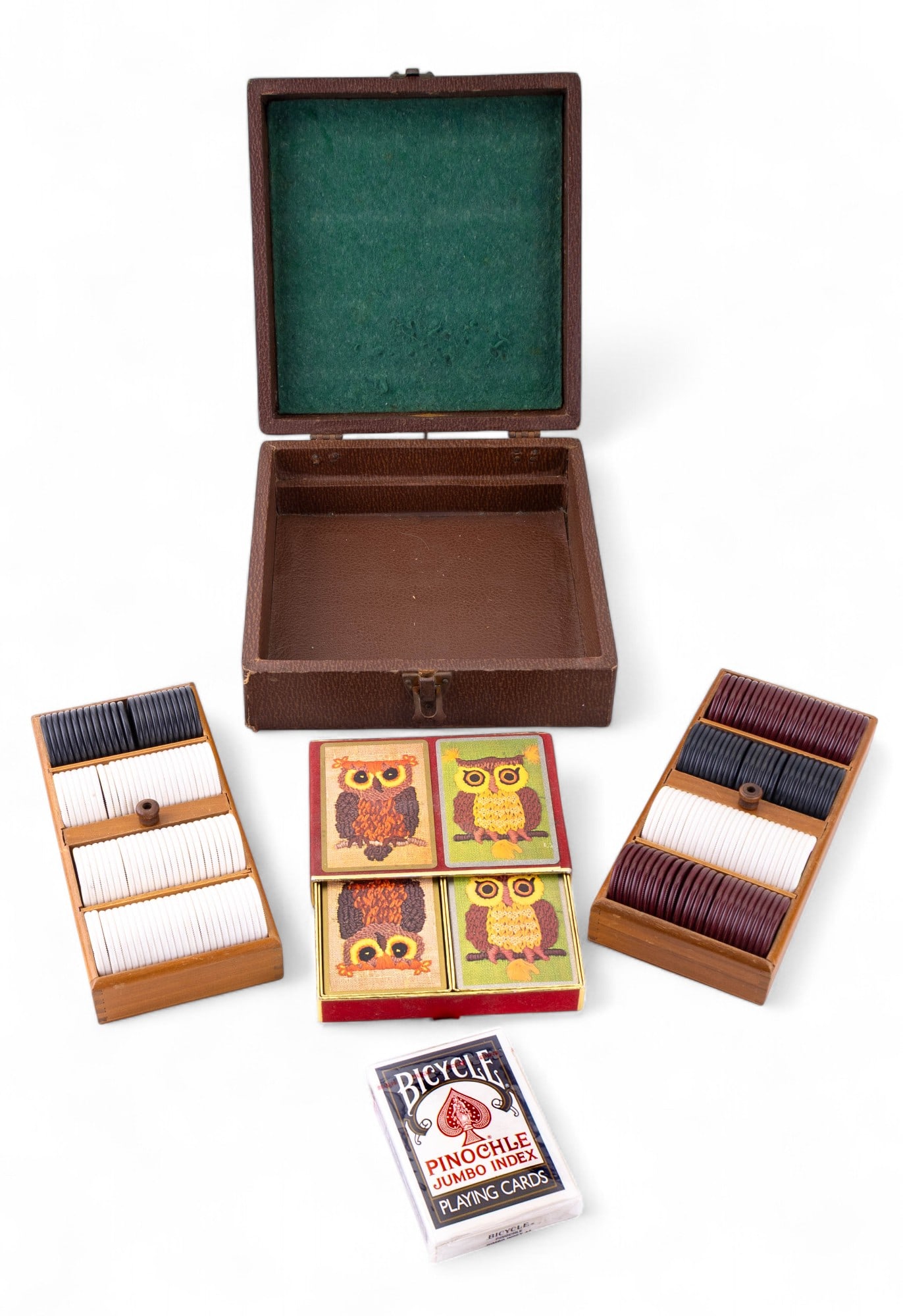 Vintage Lowe Poker Set in Case: Vintage Lowe poker chip set with case, a sealed pack of Bicycle playing cards, and a double pack of vintage Cel-U-Tone finish Congress playing cards, depicting latchook owls on the backs, with box inc