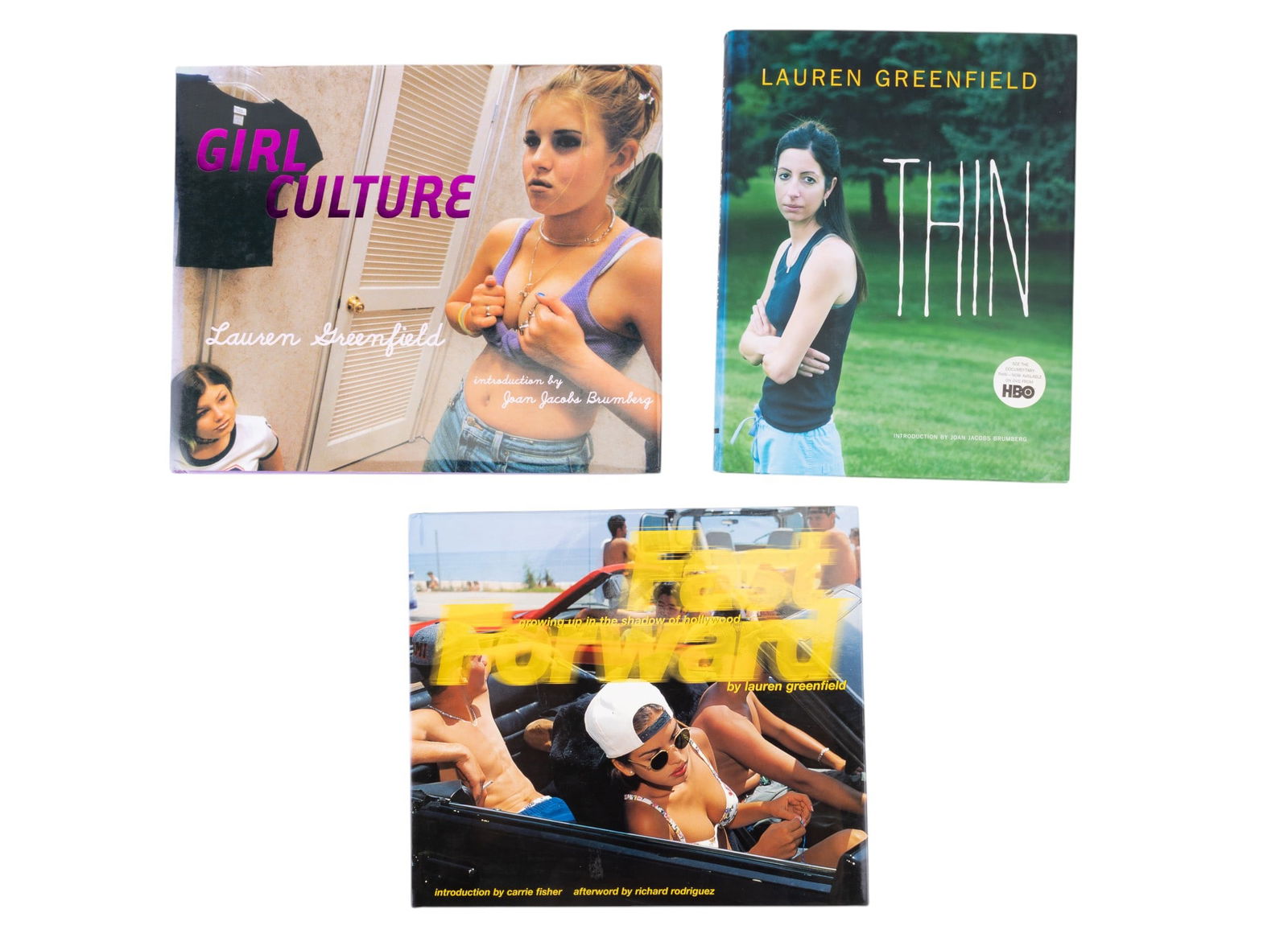 Lauren Greenfield Signed Photography Books (3): Collection of 3 signed works by acclaimed American documentary photographer and filmmaker Lauren Greenfield including: Thin (2006) signed on the title page; Fast Forward: Growing Up in the Shadow of H