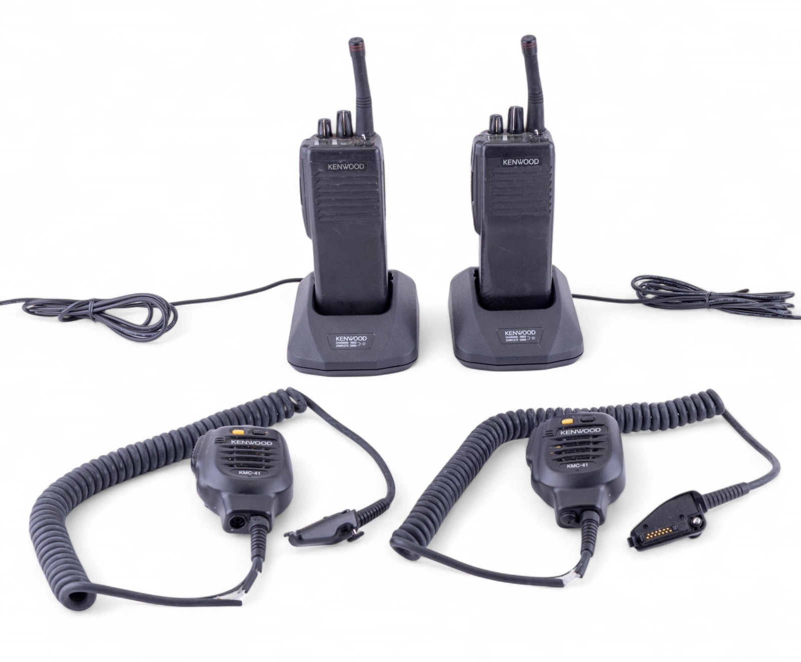 Kenwood Portable Radios: Pair of vintage Kenwood handheld 2-way radios with antennas, each accompanied by it's charging base and Kenwood KMC-41 speaker microphone. Untested, sold as is.