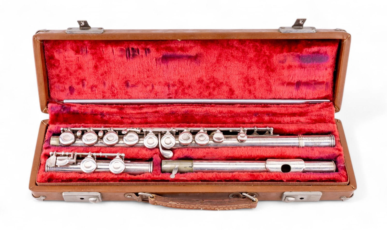 The Reynolds Flute with Case: The Reynolds flute with case made by F.A. Reynolds Co Cleveland, OH, serial #29676. Note some oxidization and wear to case due to age and use. Musical instrument.