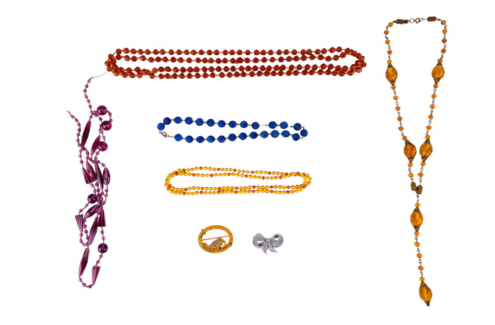 Miriam Haskell and Art Deco Jewelry: Includes several amber-hued Art deco glass necklaces, a purple early glass necklace, and a blue glass necklace. Also includes 4 pins, 1 signed "Miriam Haskell" and a chrome ribbon pin. (Haskell is mis