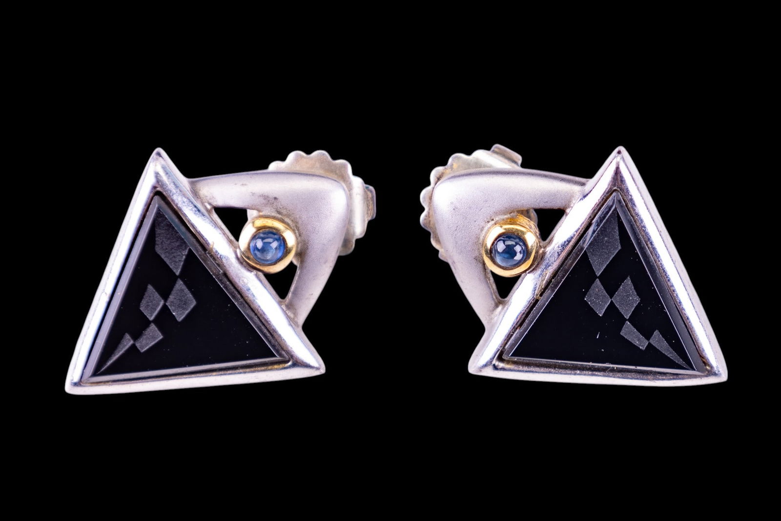 Modern Sterling Artisan Earrings: Sterling silver handmade earrings set with a large triangular onyx and cabochon sapphire accent stone.
