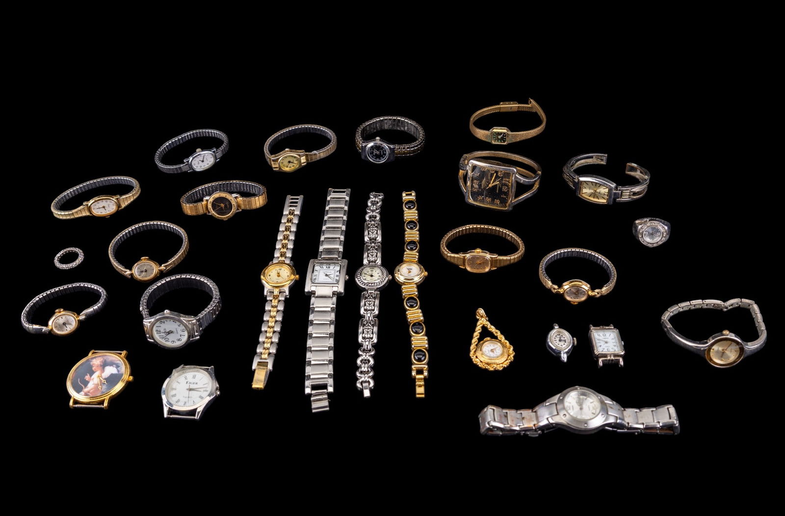 Large Ladies Watch Grouping (20+ Pc): Grouping of ladies watches including brands such as Eiger, Timex, Carriage, Gitano, Capella, Terner, Saxony, Vivani, Geneva, & more. Approximately 25 pieces. Watches are untested.