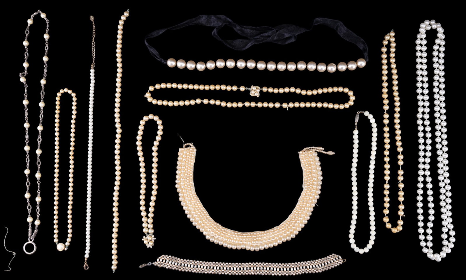 Imitation Pearl Necklaces (12): Collection of 12 imitation / faux pearl necklaces featuring a variety of styles & color tones. Necklace w/ detailed silver tone chain measures approx. 28" long. See photos for further details.