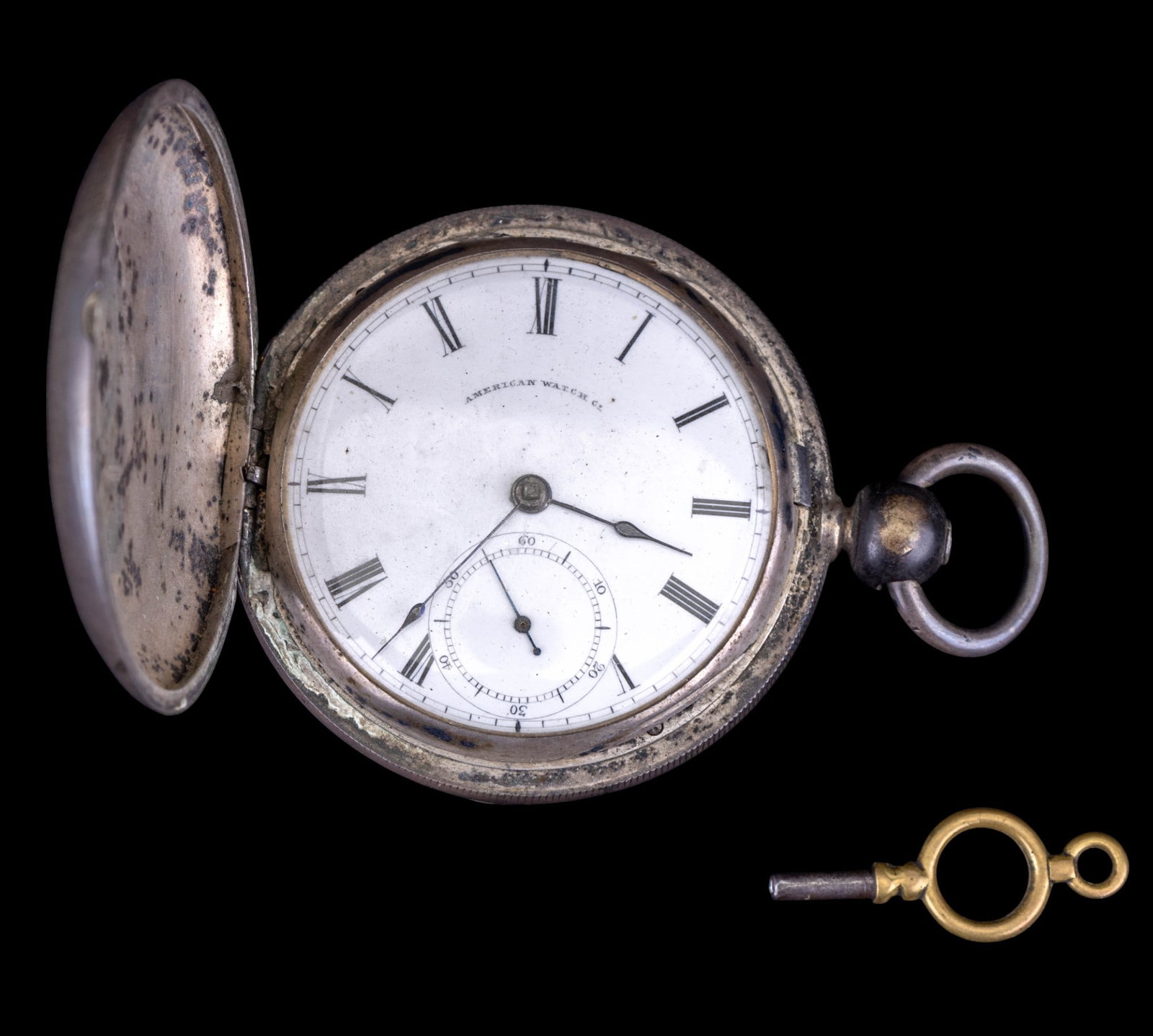 Antique Waltham Pocket Watch: American Watch Co. Waltham early key-wind P.S. Bartlett signed movement in a silver case, including its original key. Movement #171255, case #8237, face diameter measures approx. 2".