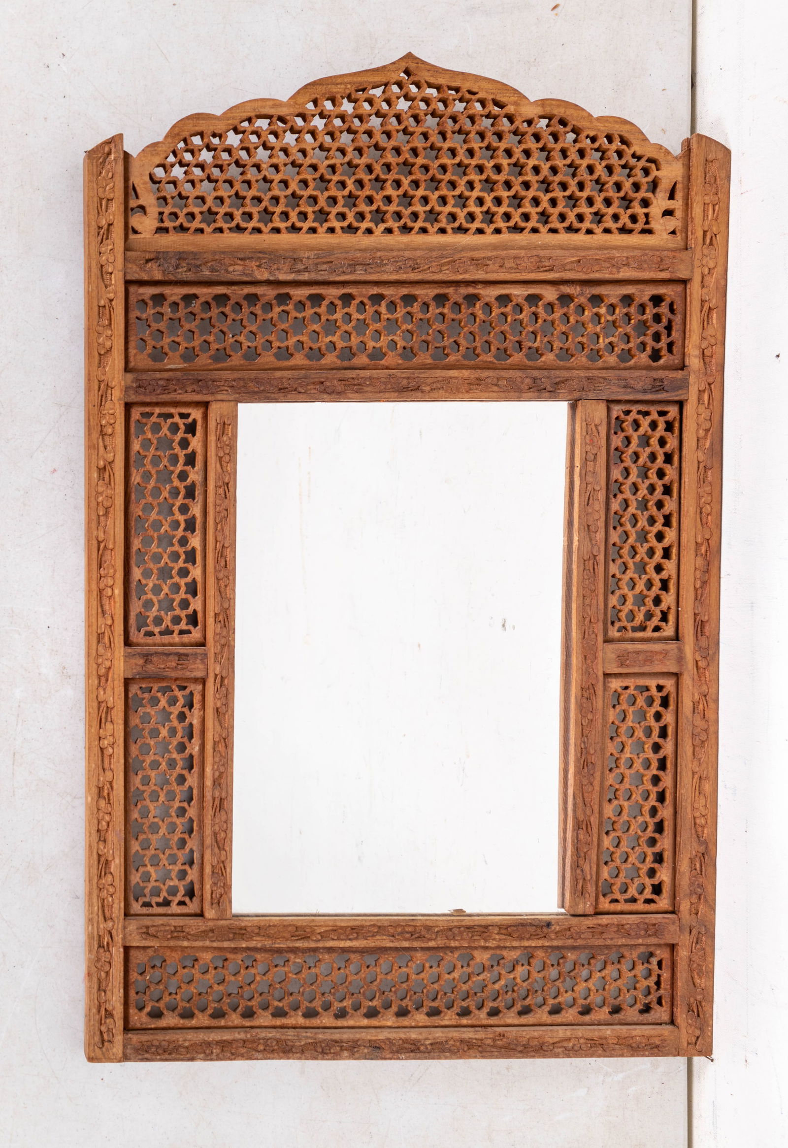 Moroccan Reticulated Wood Framed Wall Mirror: Vintage Moroccan carved reticulated wood framed wall mirror, measures approx. 22" W x 34" H.