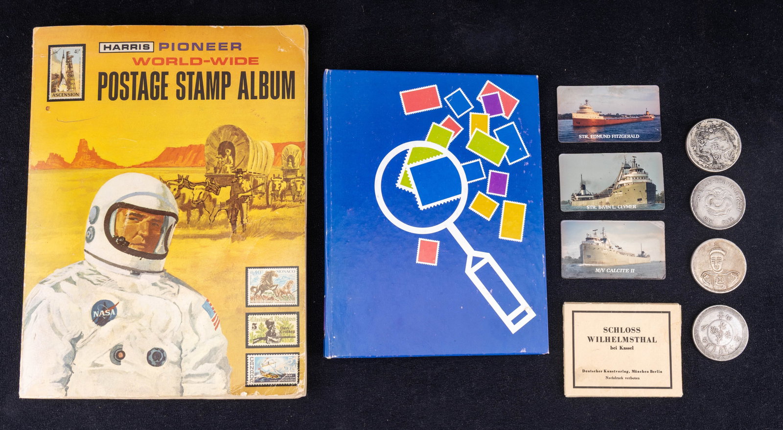 Vintage Stamp Albums and Chinese Coins: Vintage small binder postage stamp album issued by USPS, featuring various themed and shaped U.S. and International postage, canceled and unused, a Harris Pioneer World-Wide postage stamp album, photo